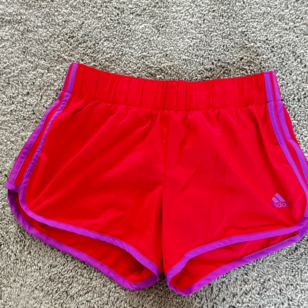 Red Adidas shorts, size S